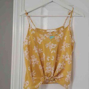 yellow and white flowered tank